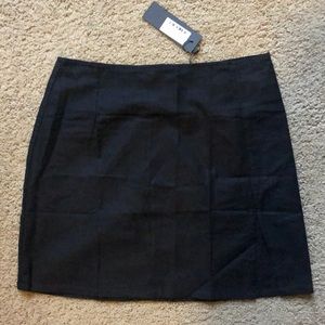 Black mini skirt with small slit